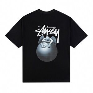 Stussy Black Tee with White Logo and Gray Angel 8-Ball Graphic